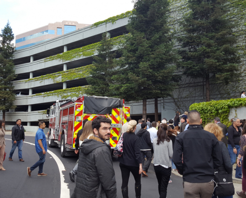 Employees Leaving Building In Emergency