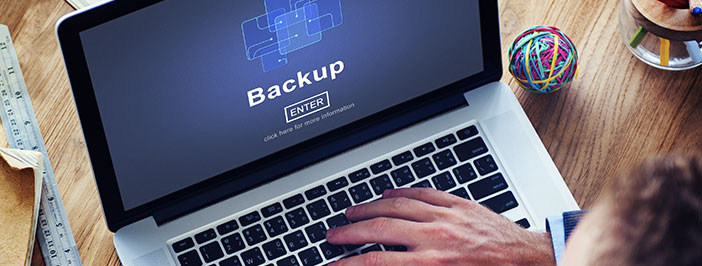 Computer that reads "backup"