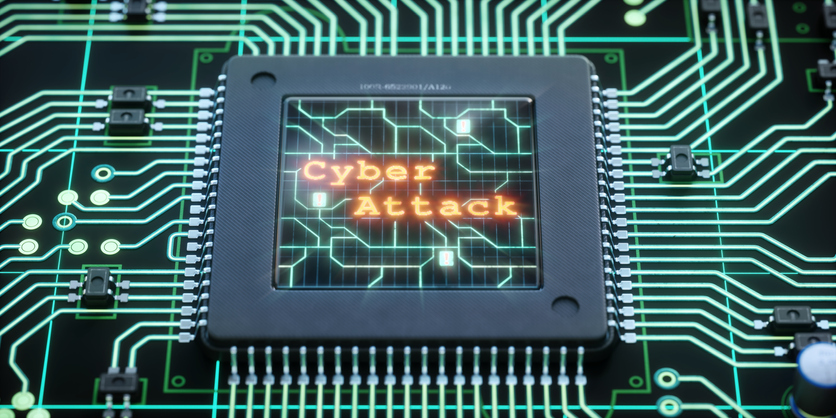 Microchip Close-up With Cyber-Attack Message