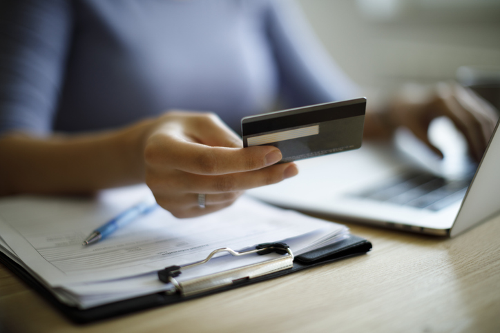 Woman using credit card 