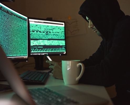 Hacker using PC